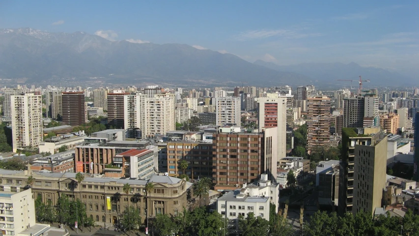 a view of a city with mountains in the background, by Alejandro Obregón, flickr, capital plaza, wikimedia, laputa, top view