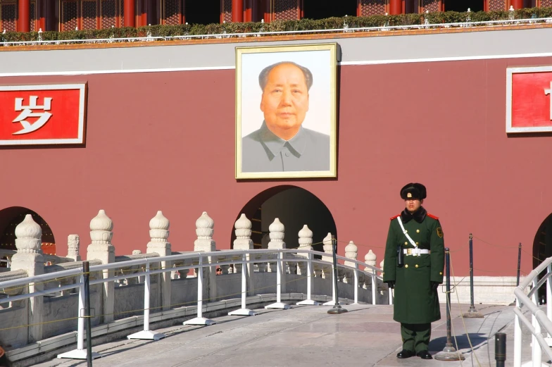 a man that is standing in front of a building, a photo, inspired by Wang Zhongyu, leader, wikimedia commons, portrait of a big, display