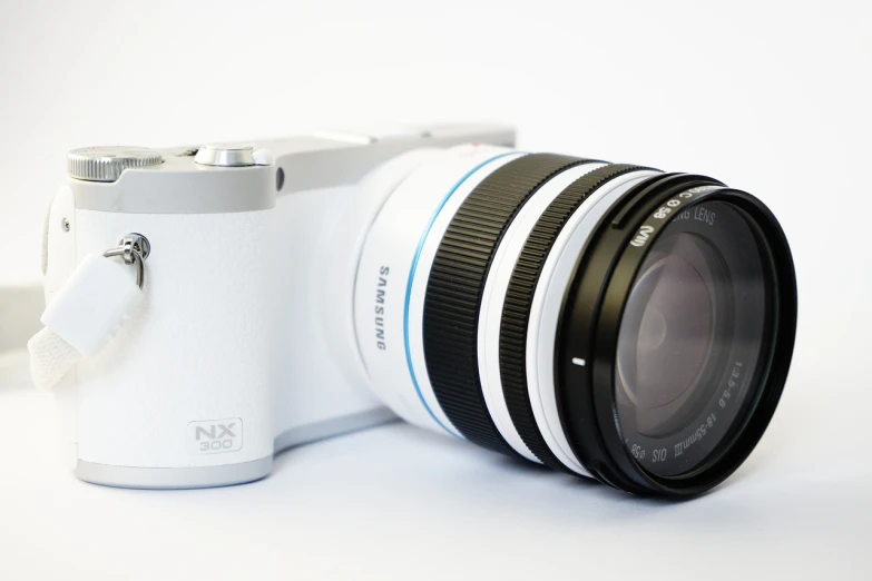 a white camera with a lens attached to it, by Shen Zhou, pixabay, ultrawide lens”, photorealistic - h 6 4 0, iso640, smartphone photo