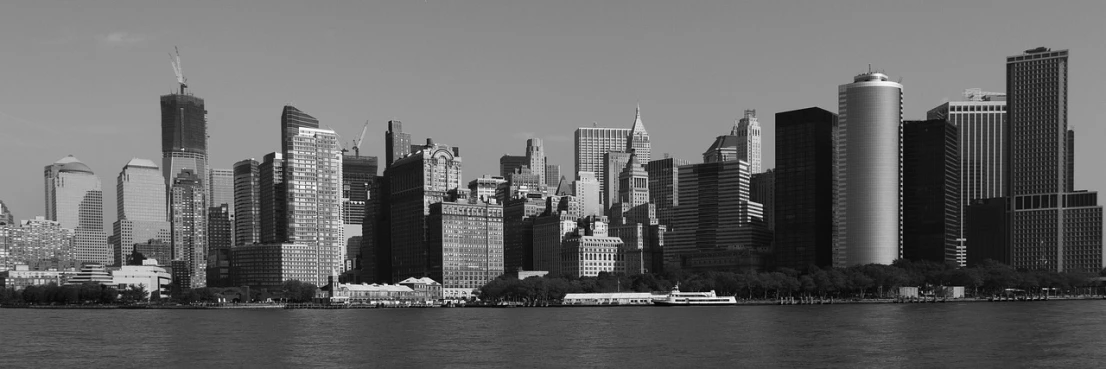 a black and white photo of a city skyline, a black and white photo, flickr, new york harbour, shot with hasselblade camera, gorgeous buildings, white buildings