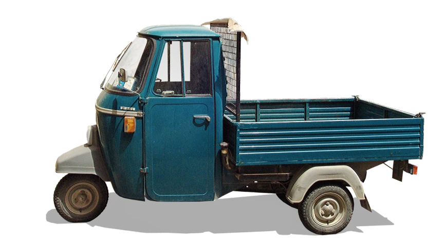a blue truck parked on the side of the road, inspired by T. K. Padmini, pixabay, renaissance, moped, sandro bottecelli, front view 2 0 0 0, ape