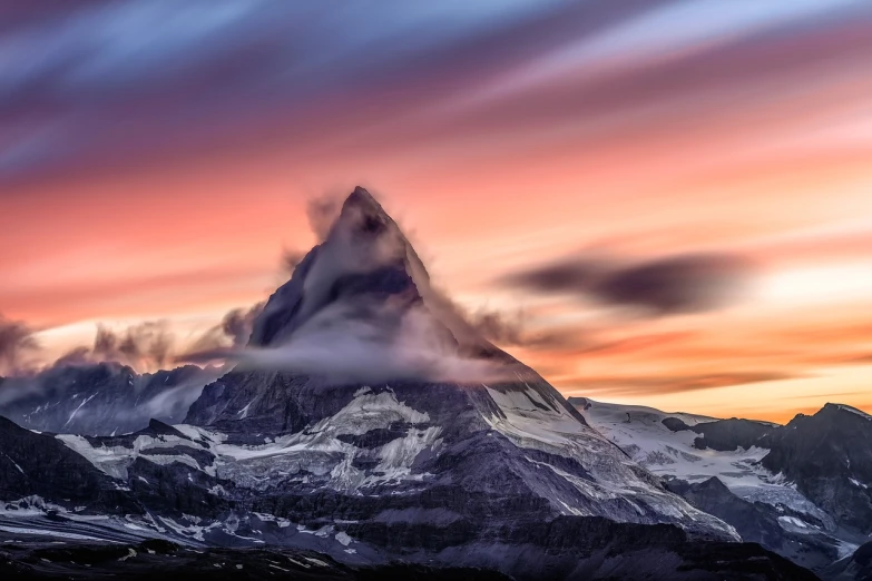 a mountain covered in snow and clouds at sunset, a tilt shift photo, by Johannes Voss, shutterstock contest winner, colorful swirly magical clouds, peak, by greg rutkowski, long exposure photography