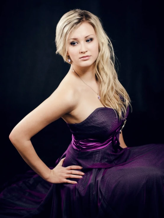 a woman in a purple dress posing for a picture, a portrait, by Antoni Brodowski, flickr, jessica nigri, formal attire, strapless dress, olya bossak