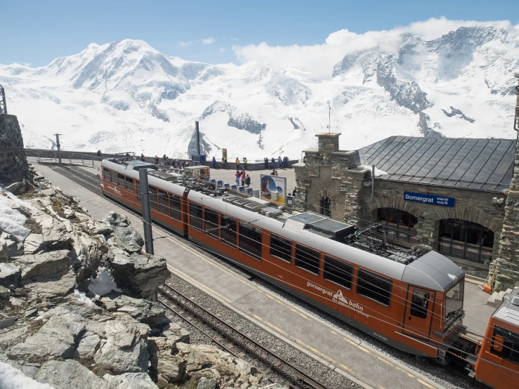 a large long train on a steel track, by Werner Andermatt, shutterstock, alpine architecture, glacier, tredning on art station, high res photo