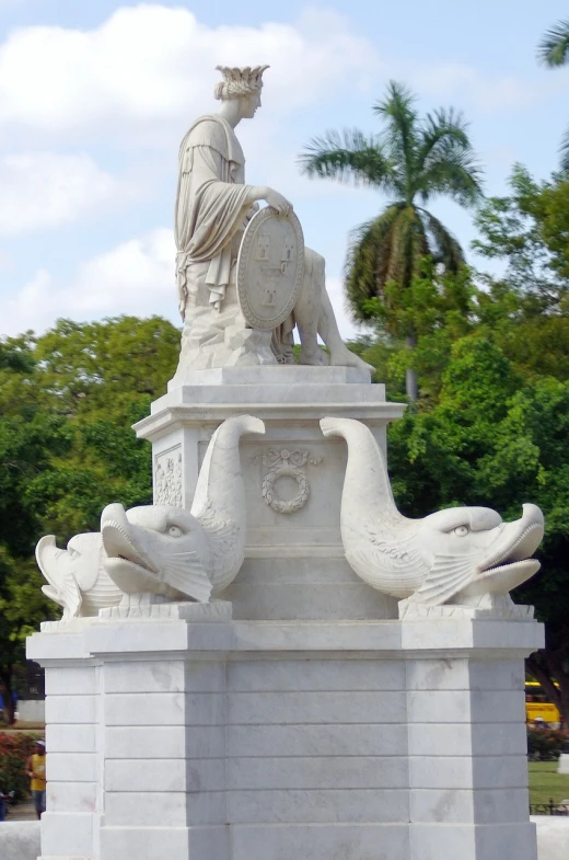 a statue sitting on top of a white pedestal, by Luis Miranda, swan, cuba, empress, not cropped