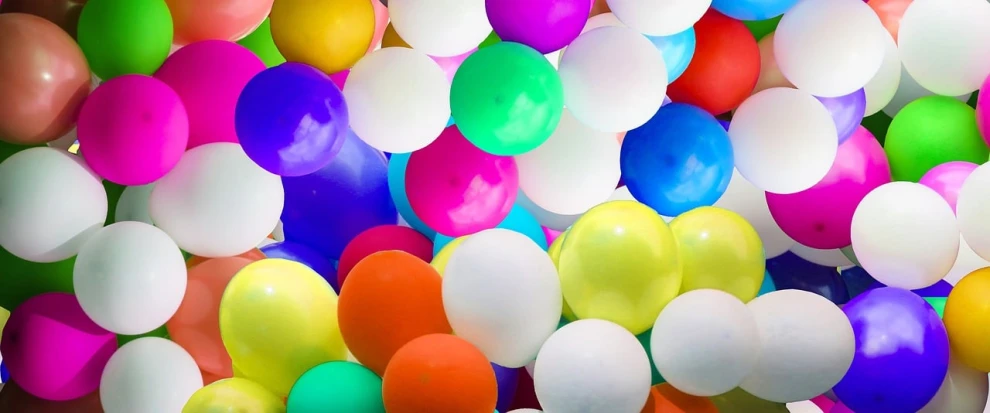 a bunch of colorful balloons floating in the air, a picture, inspired by Peter Alexander Hay, sensory processing overload, colors white!!, colorful”, up-close
