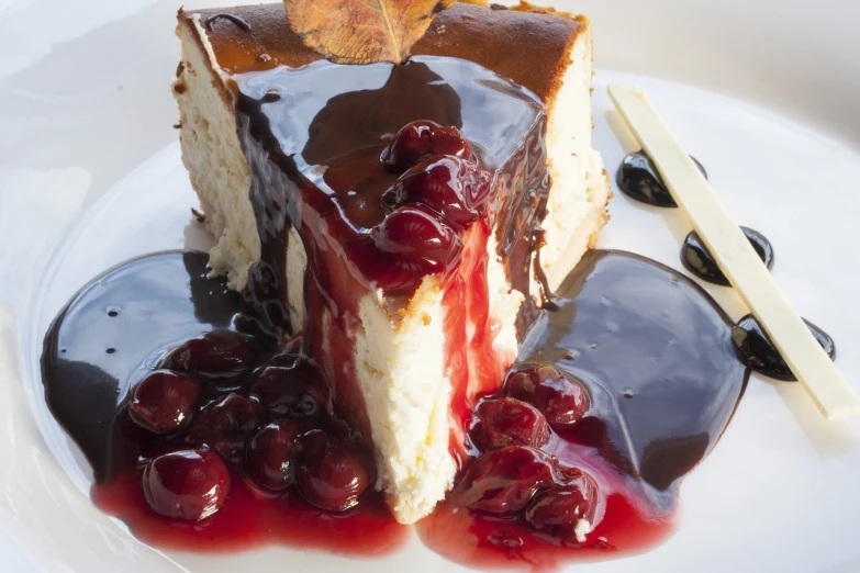 a piece of cake sitting on top of a white plate, by David Garner, pexels, cherry explosion, some chocolate sauce, closeup 4k, giant cherry trees