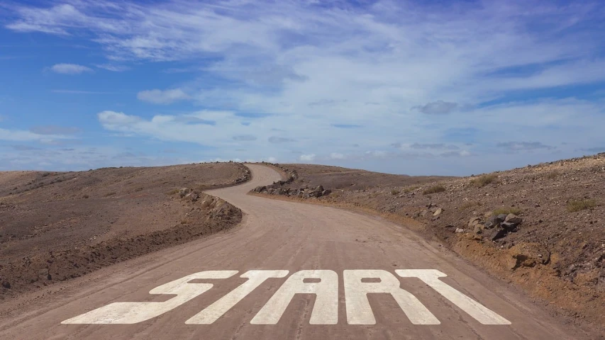 a dirt road with the word start written on it, a photo, happening, centered horizon, mark miner, operation, beginner