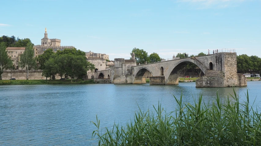 a bridge over a body of water with a castle in the background, a picture, les nabis, 6 4 0, photo taken in 2018, roman city, bridges crossing the gap