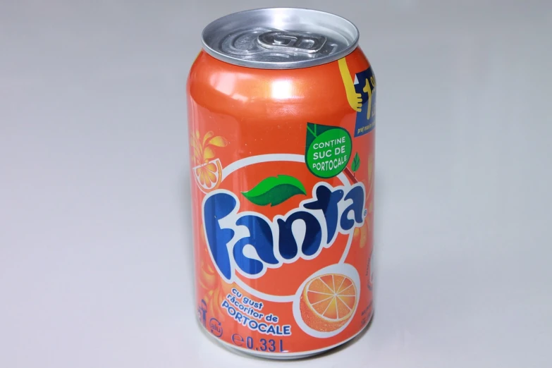 a can of orange soda sitting on a table, by Francisco Zúñiga, flickr, fanbox, tane skin, lolita, cant believe it is real