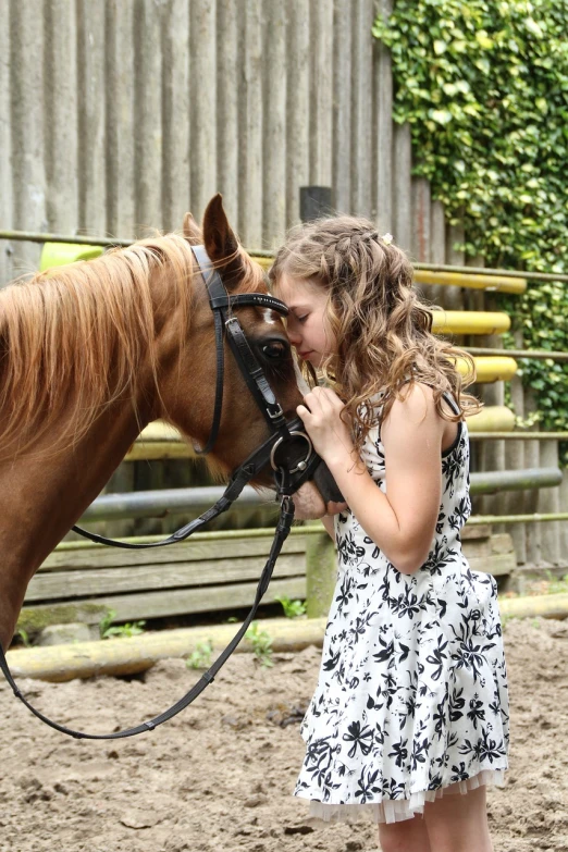 a young girl standing next to a brown horse, a portrait, by Caroline Mytinger, pixabay, kissing each other, marthe jonkers, celebration, (beautiful) girl