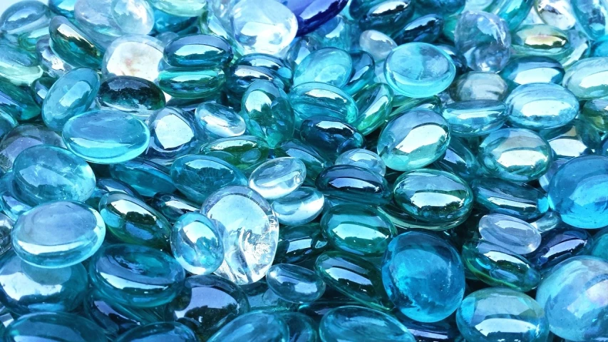 a pile of blue and green glass pebbles, pixabay, beautiful iphone wallpaper, ((greenish blue tones)), glass flame, sunny day time