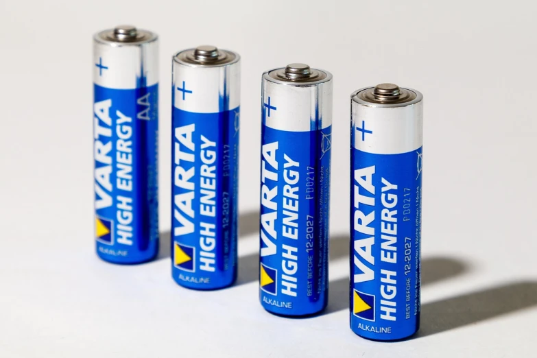 a group of batteries sitting next to each other, a stock photo, by Maria Johanna Görtz, ultramarine, very tasty, close-up product photo, halogen