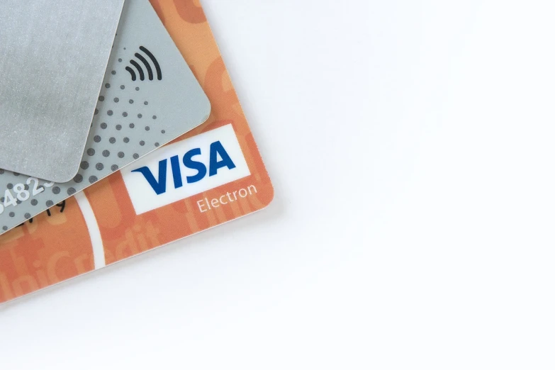 a couple of credit cards sitting on top of each other, a photo, bauhaus, visa pour l'image, banner, product introduction photo, photostock