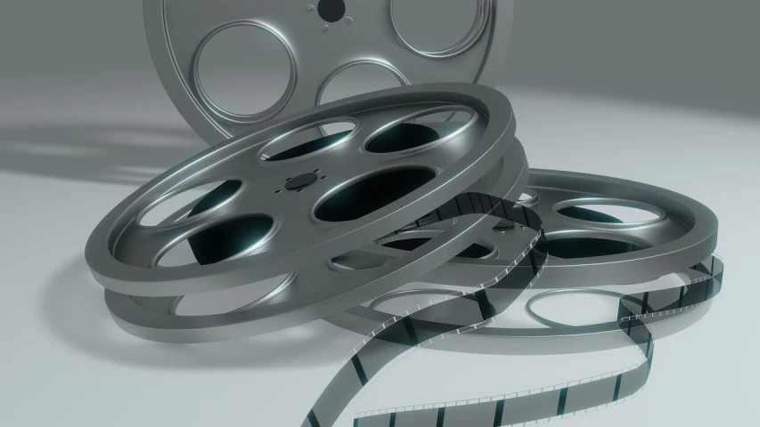a couple of film reels sitting next to each other, a 3D render, inspired by Ota Bubeníček, roger deakin's cinematography, [ theatrical ], moviestill, home video
