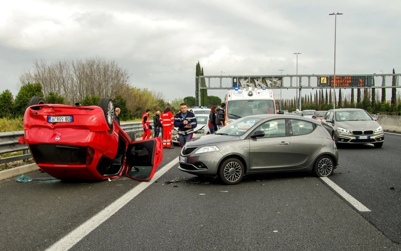 a car crashed into another car on the side of the road, a picture, by Federico Zuccari, pixabay, group photo, demo scene, ultra wide shot, renault