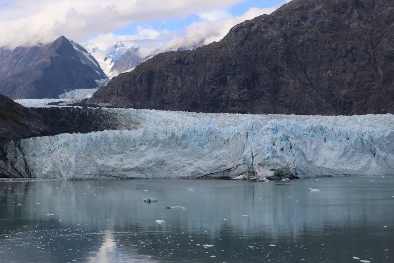 a large glacier in the middle of a body of water, by George Claessen, today\'s featured photograph 4k, viewed from the harbor, rebecca oborn, sandra pelser
