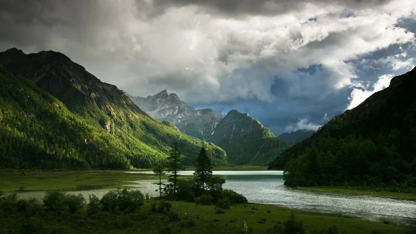 a body of water surrounded by mountains under a cloudy sky, by Cedric Peyravernay, flickr, sichuan, great light and shadows”, beutiful!, evening storm