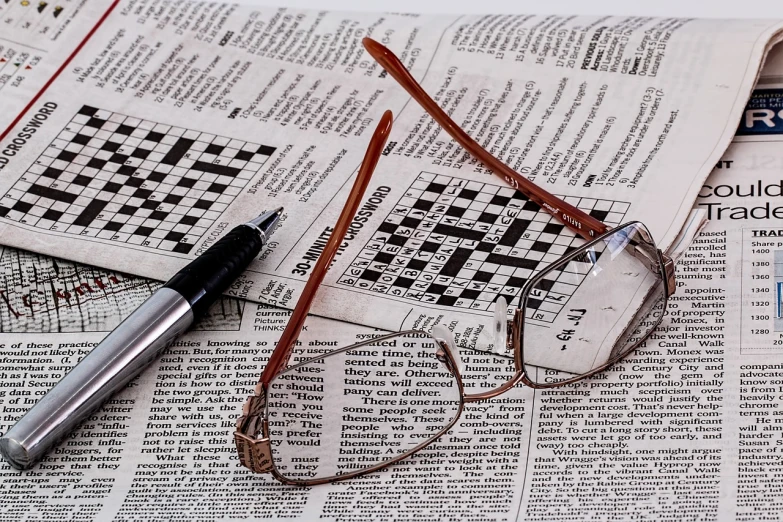 a pair of glasses sitting on top of a newspaper, a jigsaw puzzle, by Richard Carline, pixabay, photorealism, chess game, clear cross hatching, advert, pen and ink work sharp focus