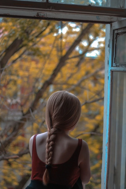 a woman with a braid is looking out a window, a picture, inspired by Elsa Bleda, shutterstock, autum, a beautiful woman with long, ilya kuvshinov with long hair, beginning of autumn