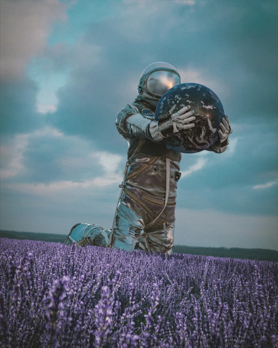 a man in a space suit standing in a field of lavender, inspired by Filip Hodas, surrealism, victor antonov, photography alexey kurylev, holding a planet, masha krasnova