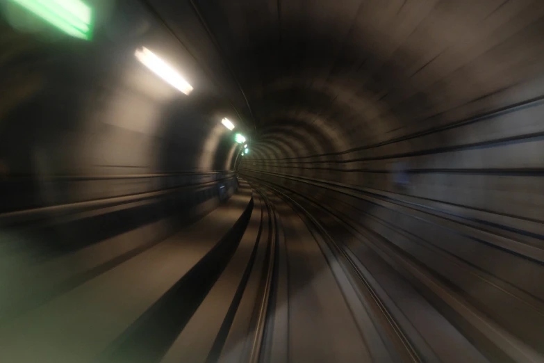 a blurry picture of a train going through a tunnel, figuration libre, けもの, pov photo, tube wave, ears