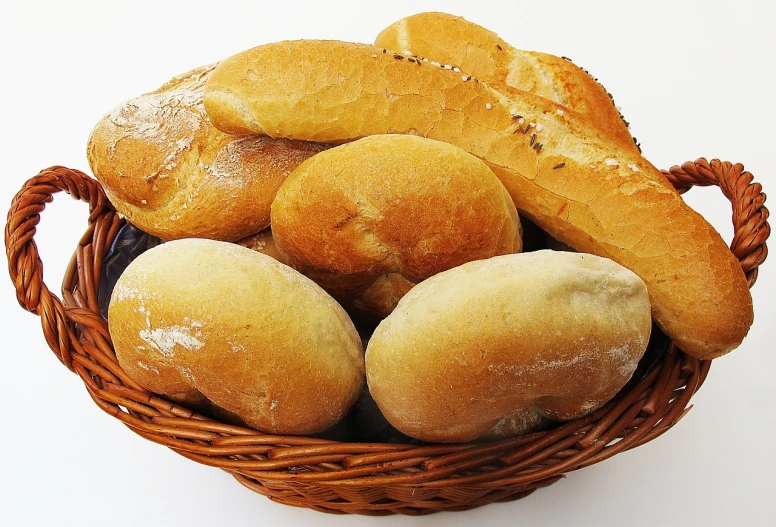 a basket filled with different types of bread, a picture, by Juan O'Gorman, pixabay, bauhaus, baking french baguette, band of gold round his breasts, white, ceramic