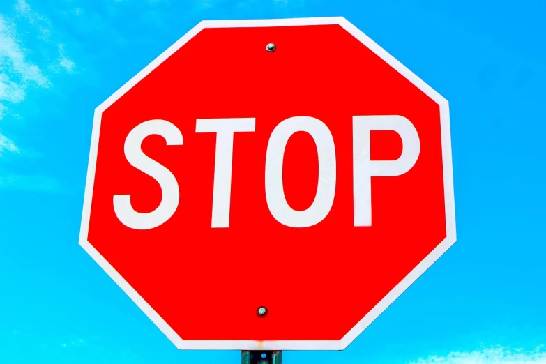 a red stop sign with a blue sky in the background, a picture, by Jan Rustem, app, steroid use, fstop of 8, hivis