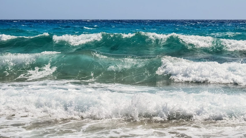 a man riding a wave on top of a surfboard, a picture, shutterstock, mediterranean beach background, glistening seafoam, wallpaper - 1 0 2 4, lots of ocean