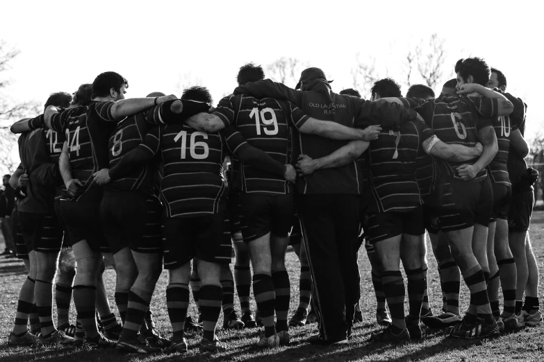 a black and white photo of a rugby team, unsplash, process art, comforting, springtime, paul heaston, thick lines