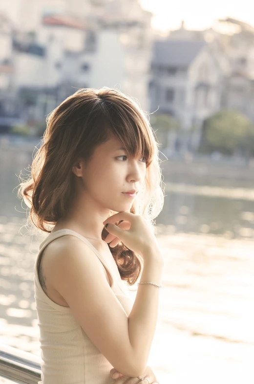 a woman standing next to a body of water, a picture, inspired by Yuko Tatsushima, shutterstock, shin hanga, side portrait of cute girl, soft backlighting, side profile cenetered portrait, prompt young woman