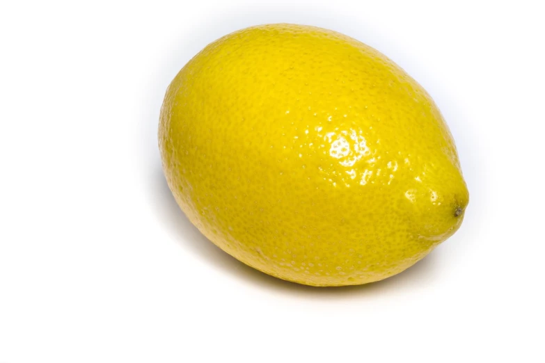 a close up of a lemon on a white surface, a picture, renaissance, istockphoto, smooth oval head, coloured, long