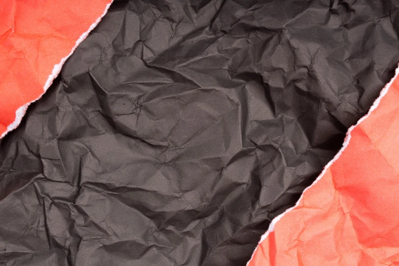 a close up of a piece of black and red paper, a stock photo, inspired by Christo, fine art, highly detailed product photo, garbage, hyper detail illustration, bright uniform background
