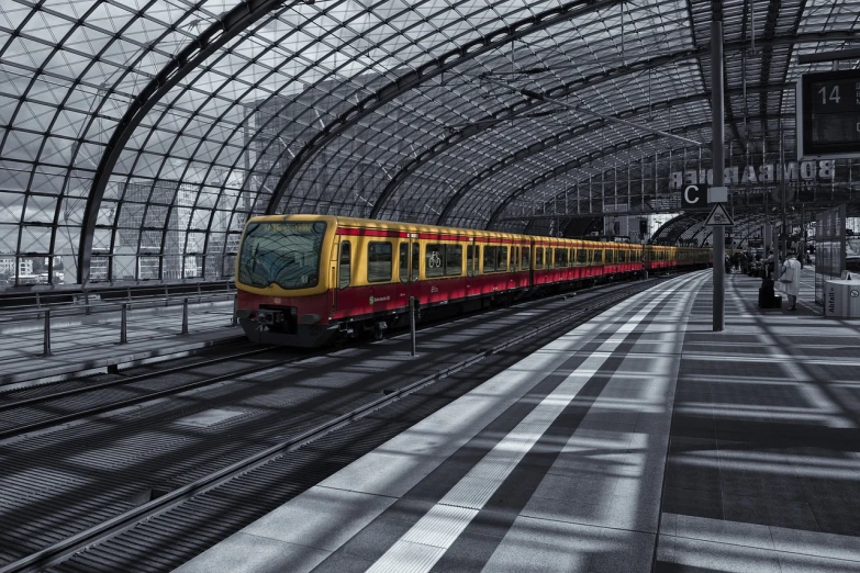 a red and yellow train traveling through a train station, a picture, by Thomas Häfner, pixabay contest winner, monochromatic photo, berlin city, transparent background, digital art - w 640