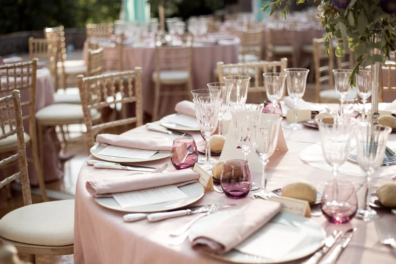 a table that has a bunch of place settings on it, by Julian Allen, shutterstock, renaissance, pink and gold color palette, outdoors setting, luxurious wedding, in spain