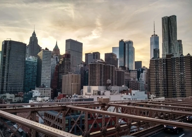 a view of a city from the top of a bridge, a picture, by Tom Wänerstrand, pexels contest winner, modernism, new york buildings, end of the day, iphone photo, today\'s featured photograph 4k