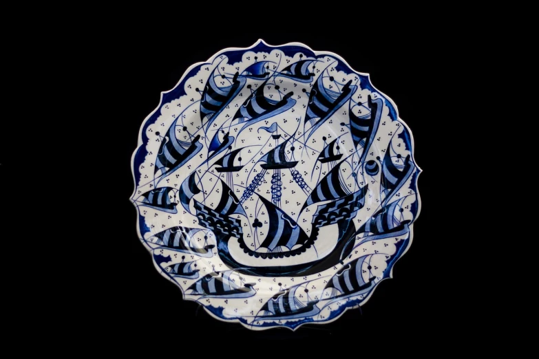 a blue and white plate with fish on it, inspired by Paul Howard Manship, qajar art, dazzle camouflage, full view, vessels, byzantine