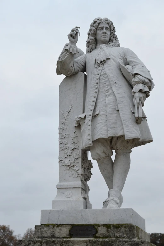 a statue of a man with a bird in his hand, a statue, by Emanuel de Witte, baroque, in louisiana, very sparse detail, holes in a religious man, in a city with a rich history