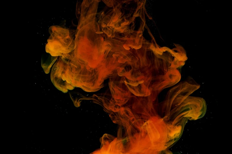 a close up of a fire on a black background, inspired by Kim Keever, digital art, ink splash, smoke and orange volumetric fog, 4k!, glowing water with caustics