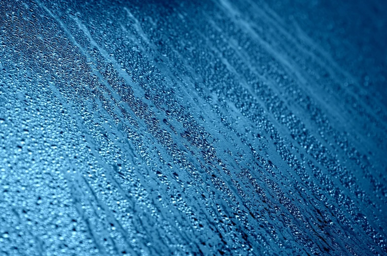 a close up of water droplets on a blue surface, a microscopic photo, shutterstock, lyrical abstraction, car, detailed lines, frosted texture, high detail”