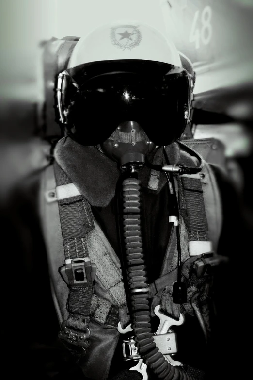 a black and white photo of a fighter, by Lee Loughridge, tumblr, pilot outfit, infra - red, helm, close-up shoot