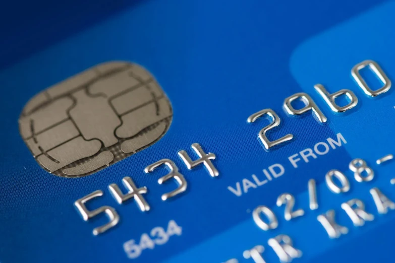 a close up of a blue credit card, by Matija Jama, figuration libre, photorealistic - h 6 4 0, abcdefghijklmnopqrstuvwxyz, information, english