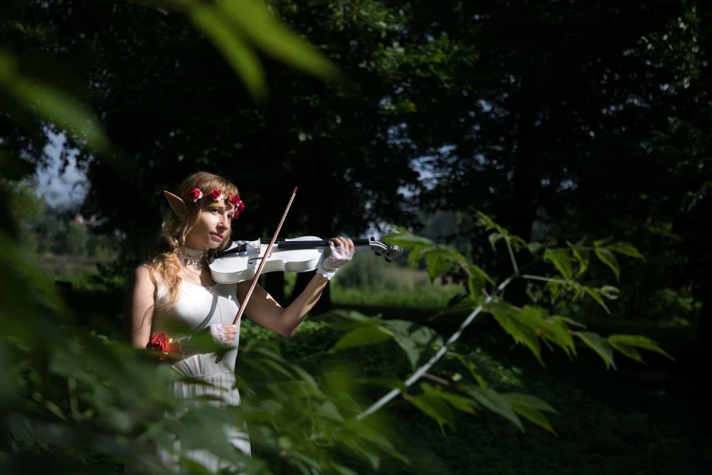 a woman in a white dress playing a violin, inspired by Konstantin Somov, romanticism, portrait of an elven warrior, cosplay photo