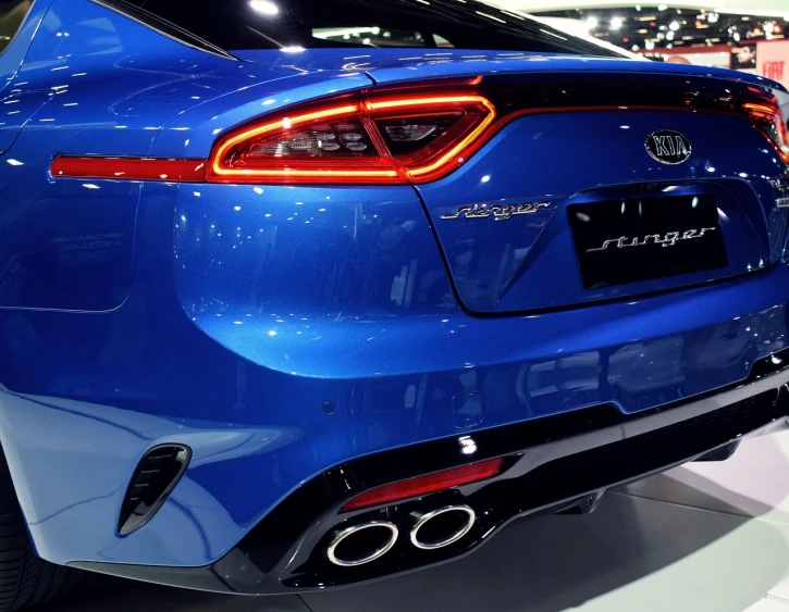 the rear end of a blue sports car, a picture, shutterstock, red and blue back light, los angeles 2 0 1 5, korean, showcase