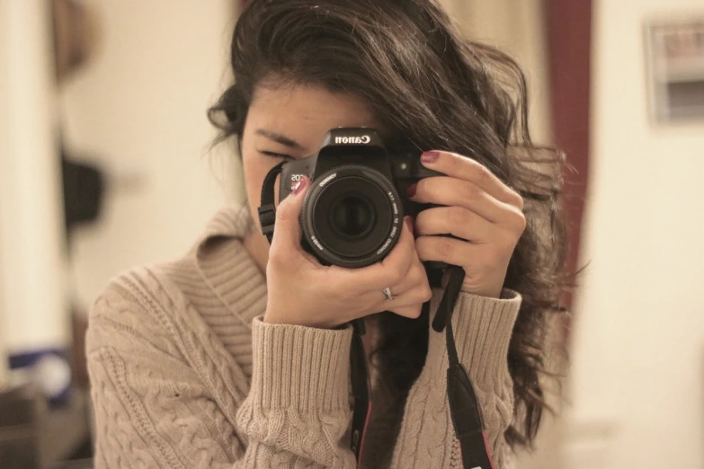 a woman taking a picture of herself with a camera, by Andrée Ruellan, profile picture, close up dslr photo, cindy avelino, soft lighting and focus