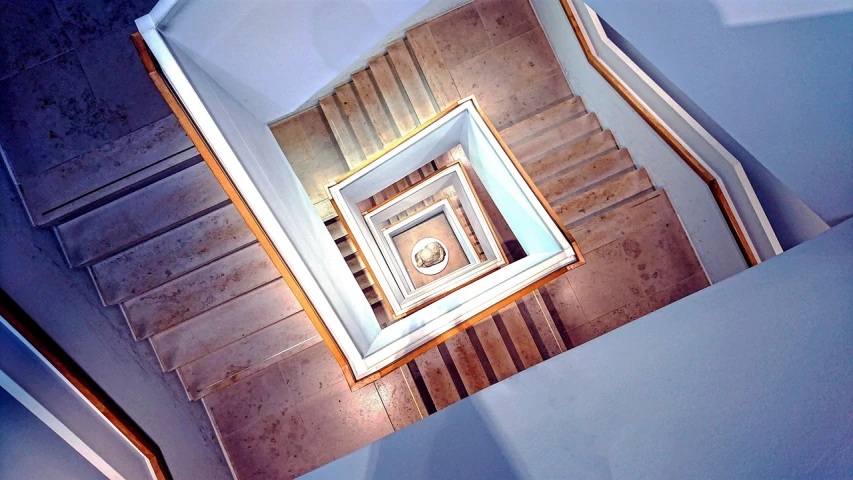 a spiral staircase leading to the top of a building, inspired by M. C. Escher, flickr, james turrell building, squares, indoor, marble hole