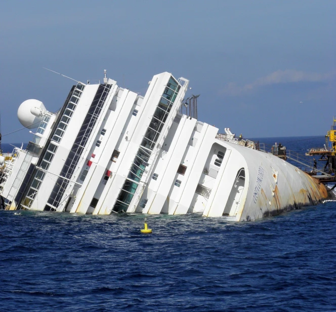 a large ship sitting in the middle of the ocean, by Eva Gonzalès, flickr, collapse, italian, posing for camera, in 2 0 1 2