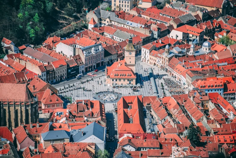 an aerial view of a city with red roofs, by Hristofor Žefarović, town square, 8k 50mm iso 10, beautiful day, bizzaro