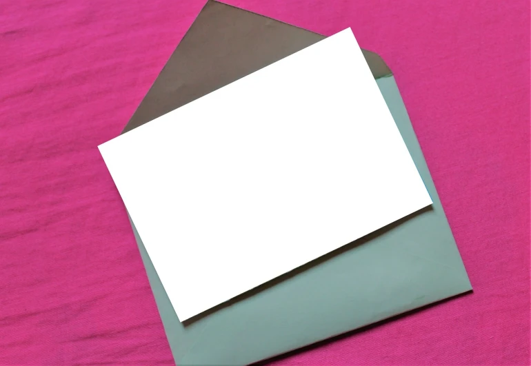 a couple of envelopes sitting on top of a pink sheet of paper, a screenshot, pexels, white cyan, card template, gray color, istock