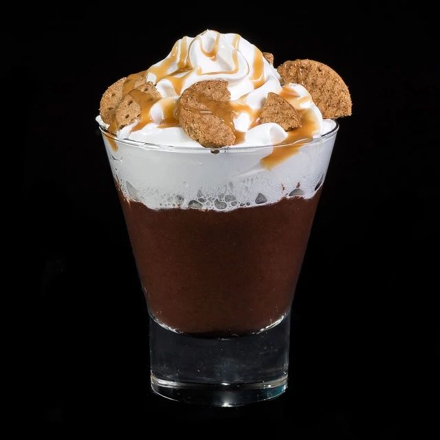 a close up of a dessert in a glass, shutterstock, on black background, highly detailed product photo, parody, brown and white color scheme